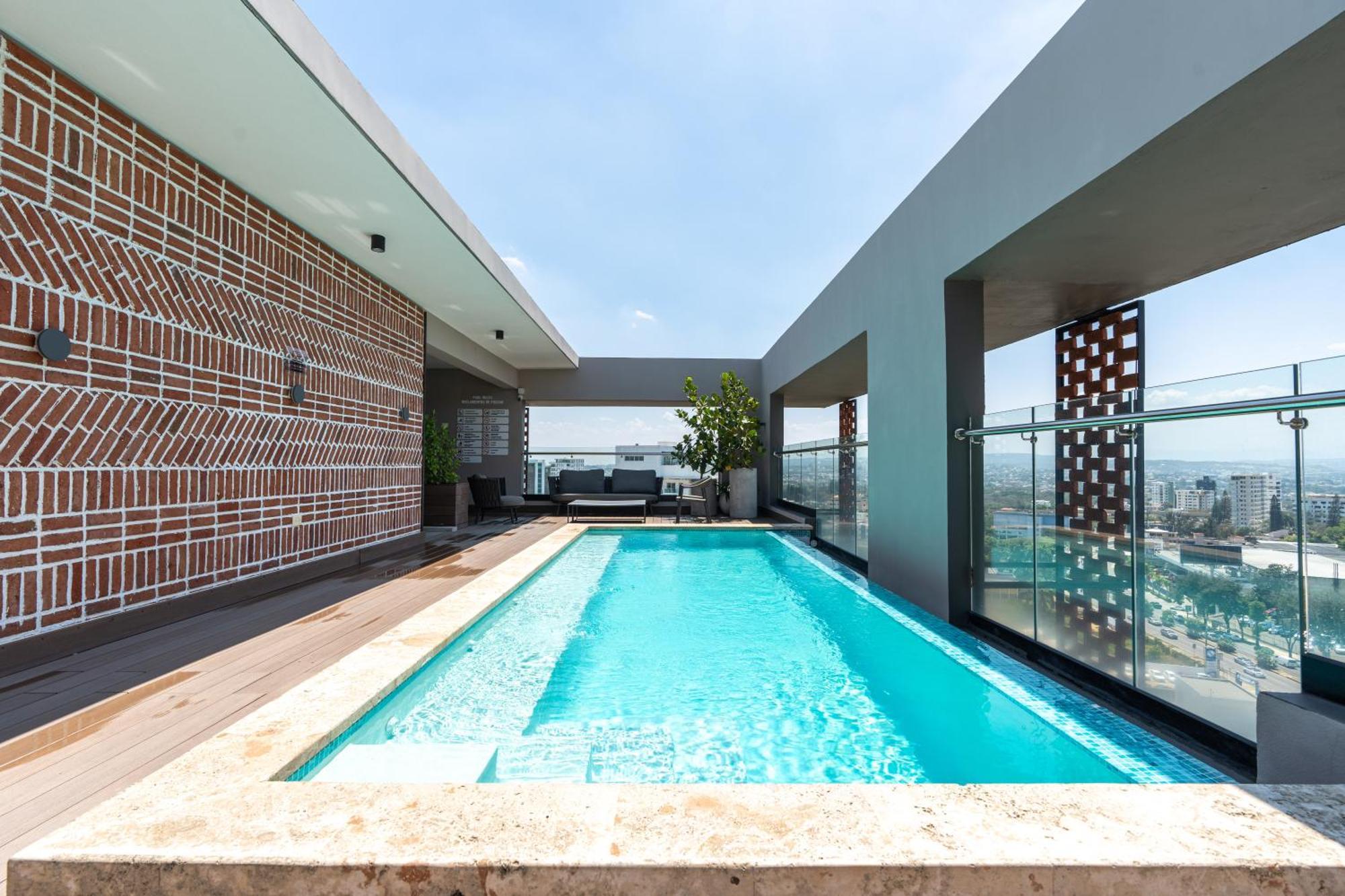 Modern Luxury Condo With Rooftop Pool & Gym Сантьяго-де-лос-Кабальерос Экстерьер фото